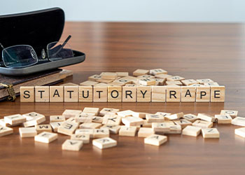 Statutory Rape word represented by wooden letter